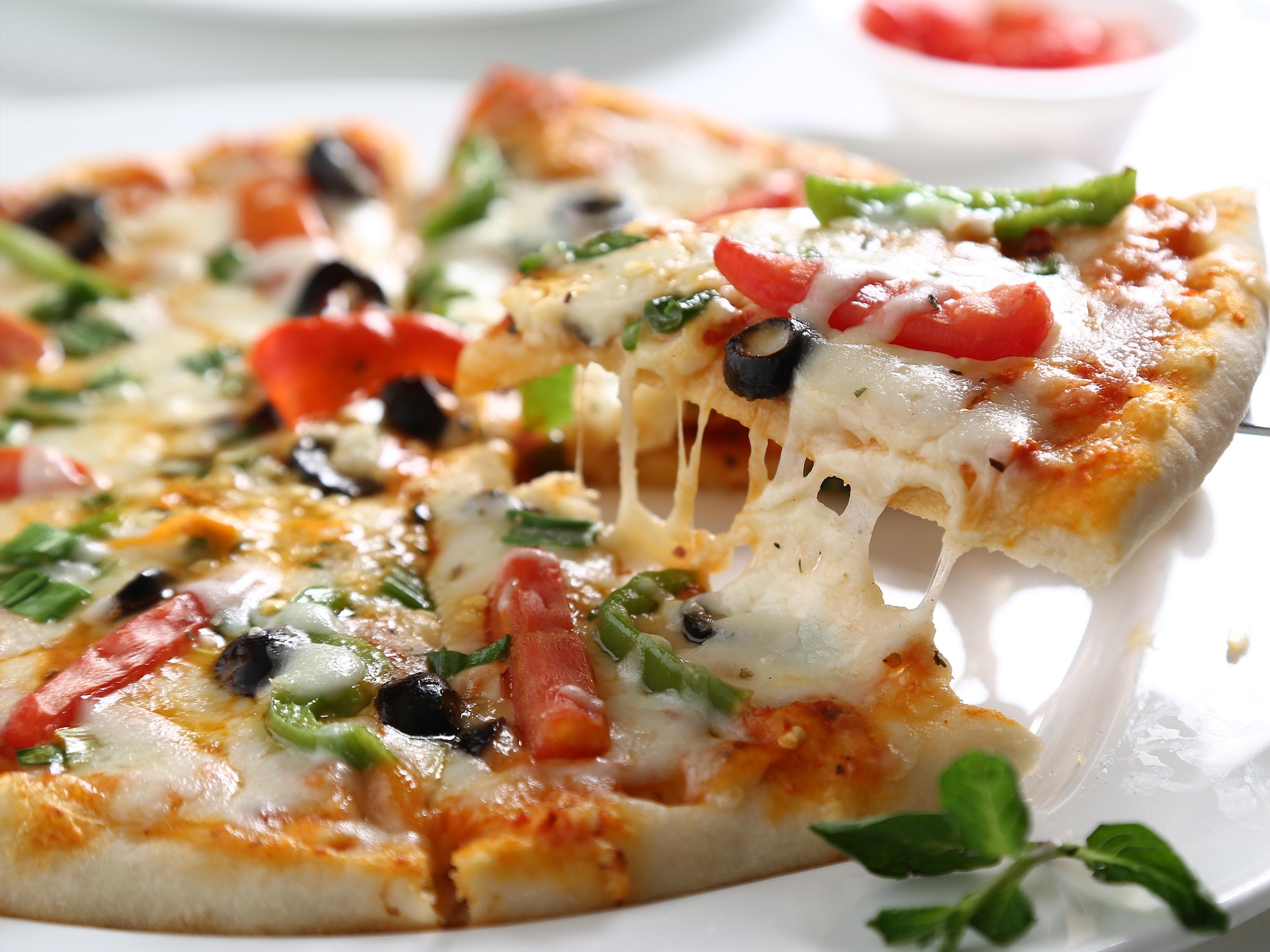 Slice of Pizza with Cheese and Veggies